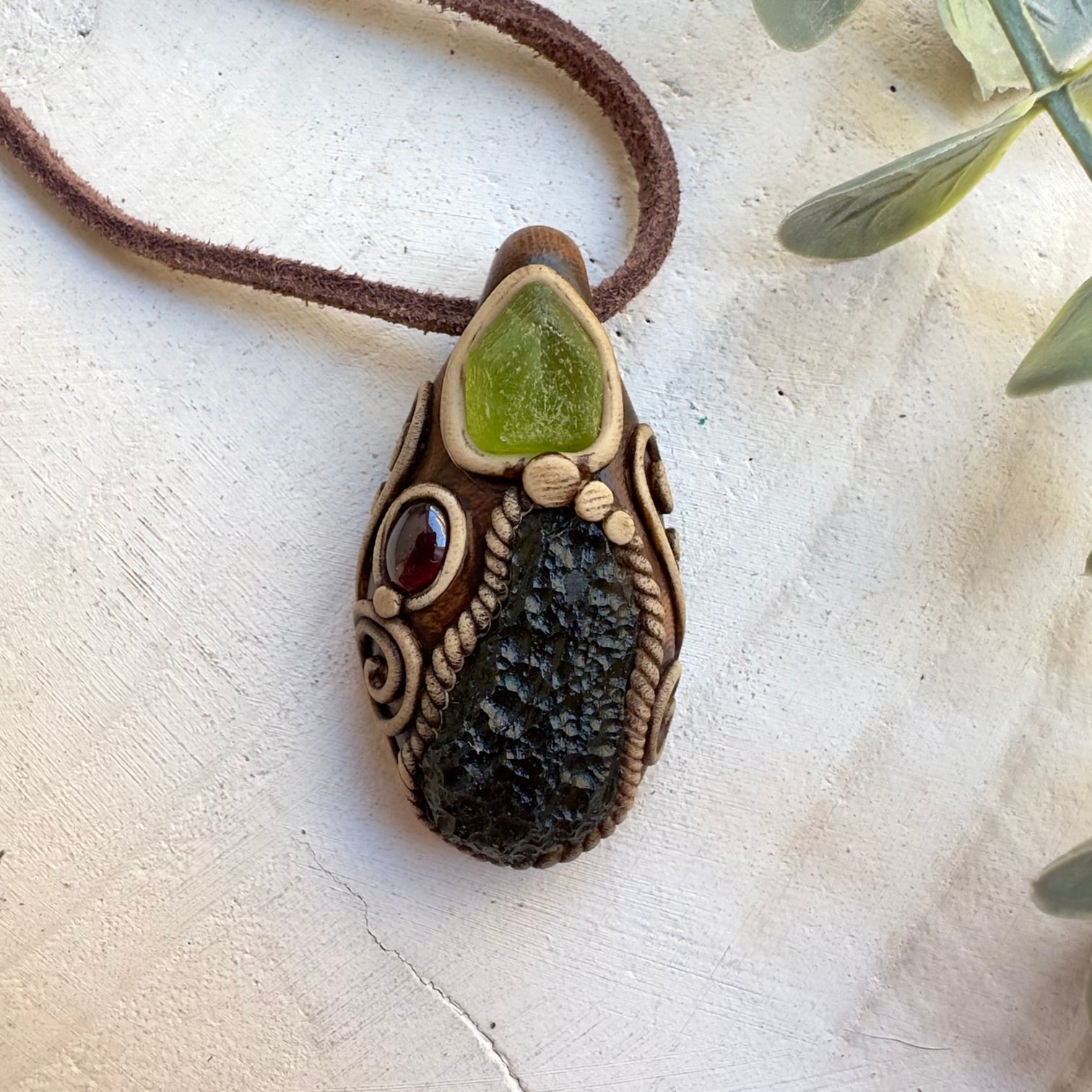 Handmade transformation necklace with moldavite and garnet