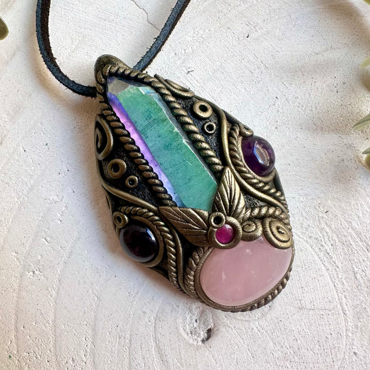 Handmade pendant necklace featuring Rose Quartz, Angel Aura Quartz Point, Amethyst and Rhodolite Garnet natural gemstones.