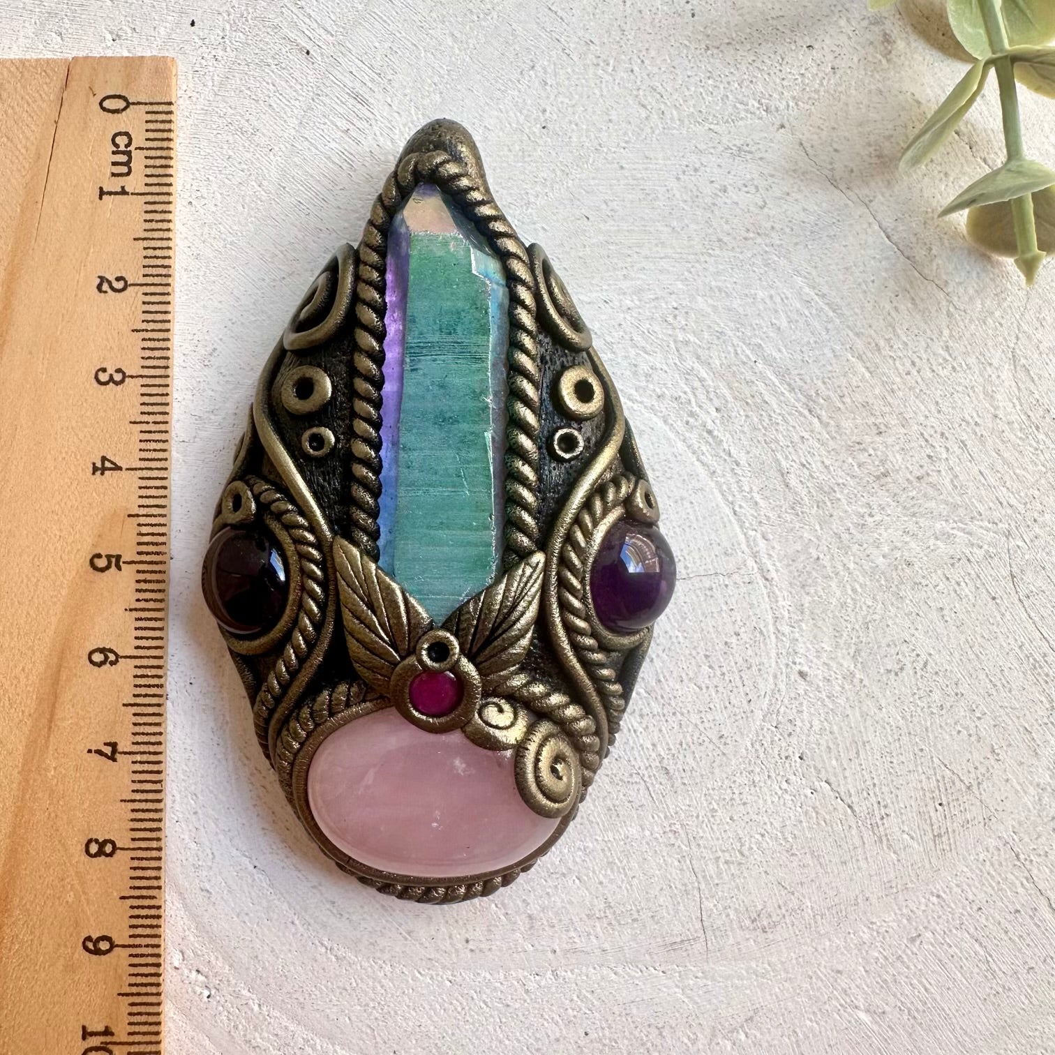 Handmade crystal jewelry featuring Rose Quartz and Angel Aura Quartz for a dreamy celestial look.