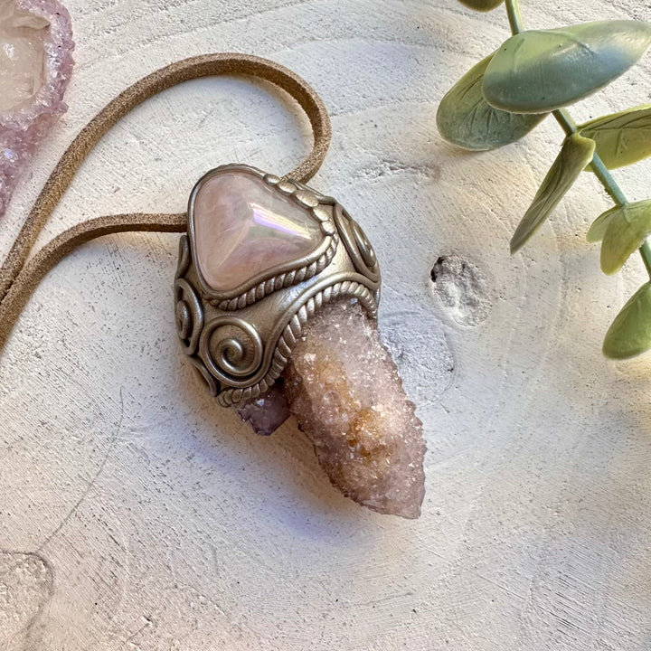 Angel aura rose quartz paired with spirit quartz in a necklace