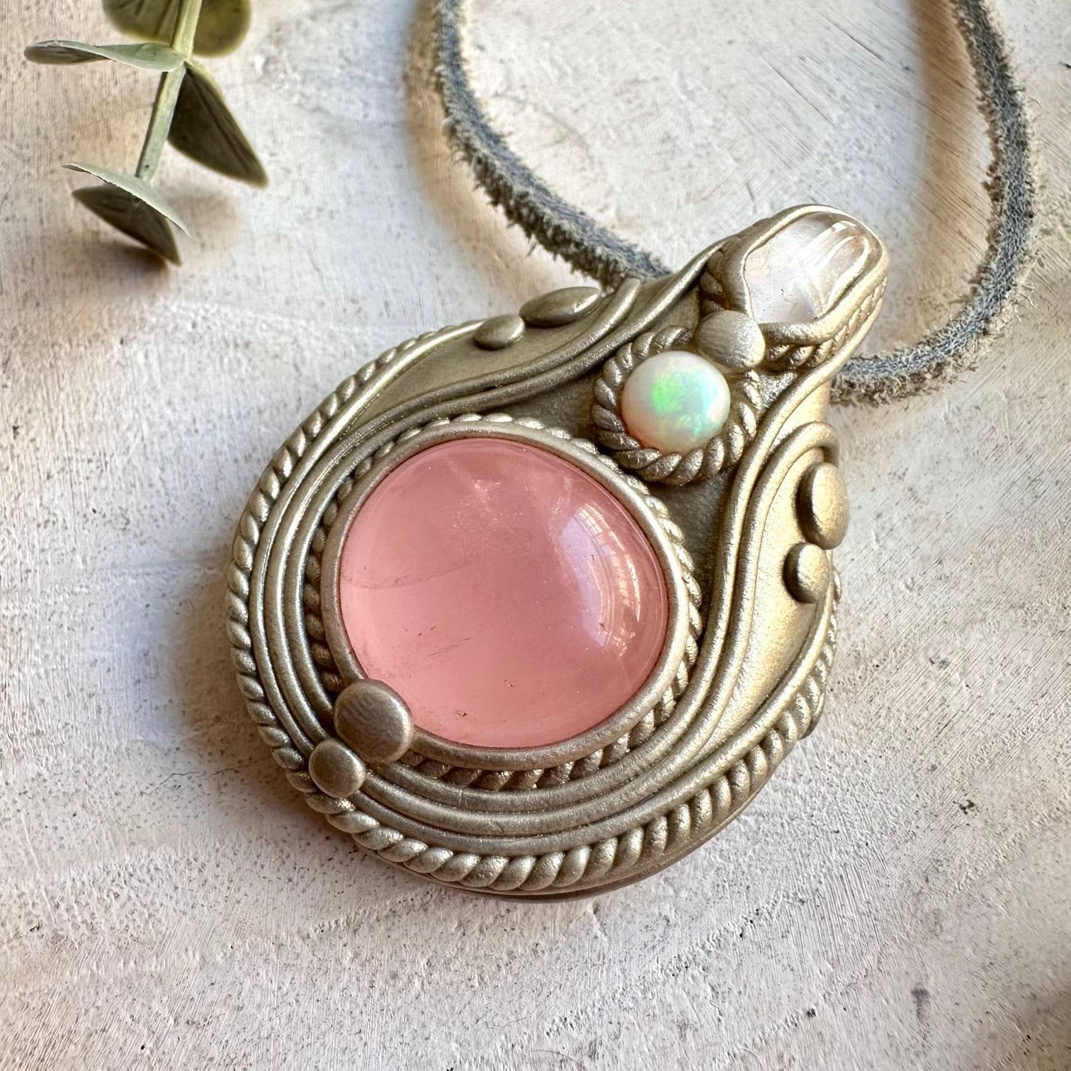 Spiritual crystal jewelry handcrafted with Rose Quartz, Danburite and Ethiopian Opal gemstones.