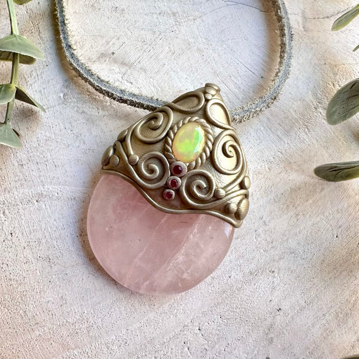 Artisan necklace showcasing soft pink Rose Quartz, luminous Ethiopian Opal and Ruby gemstone accents.