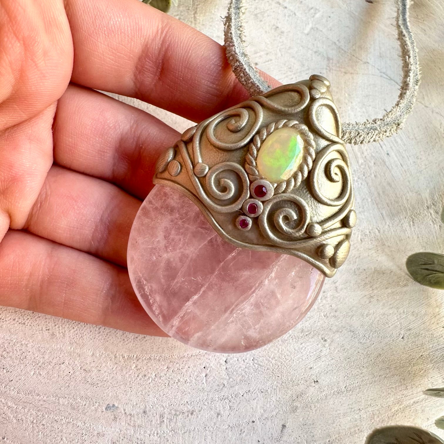 Handmade Rose Quartz, Ethiopian Opal and Ruby necklace, a one of a kind healing crystal jewelry piece combining soft pink Rose Quartz with mesmerizing Opal flashes and vibrant Ruby. An enchanting spiritual necklace for love, creativity, emotional healing, passion, confidence and personal transformation.