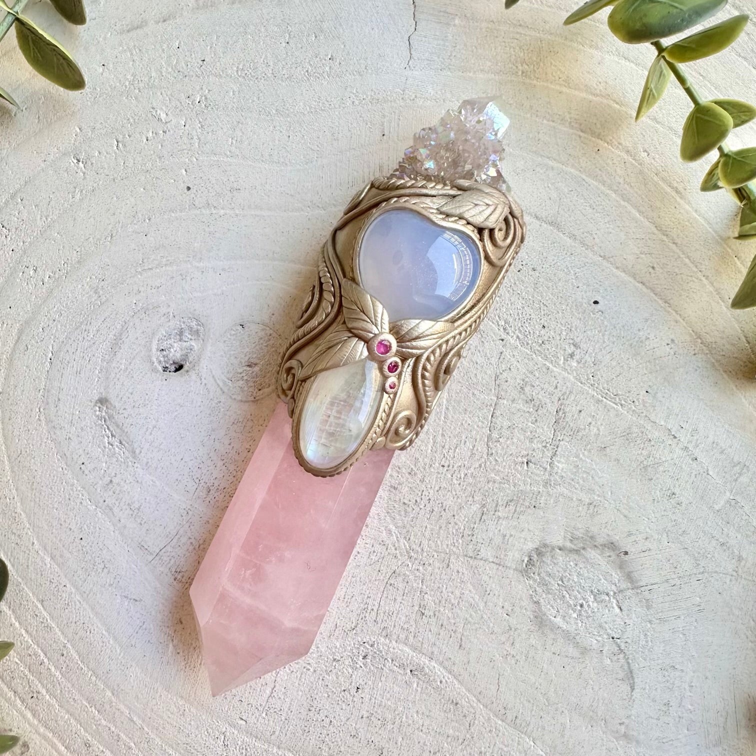 Handmade healing crystal wand with rose quartz and natural gemstones for spiritual practice