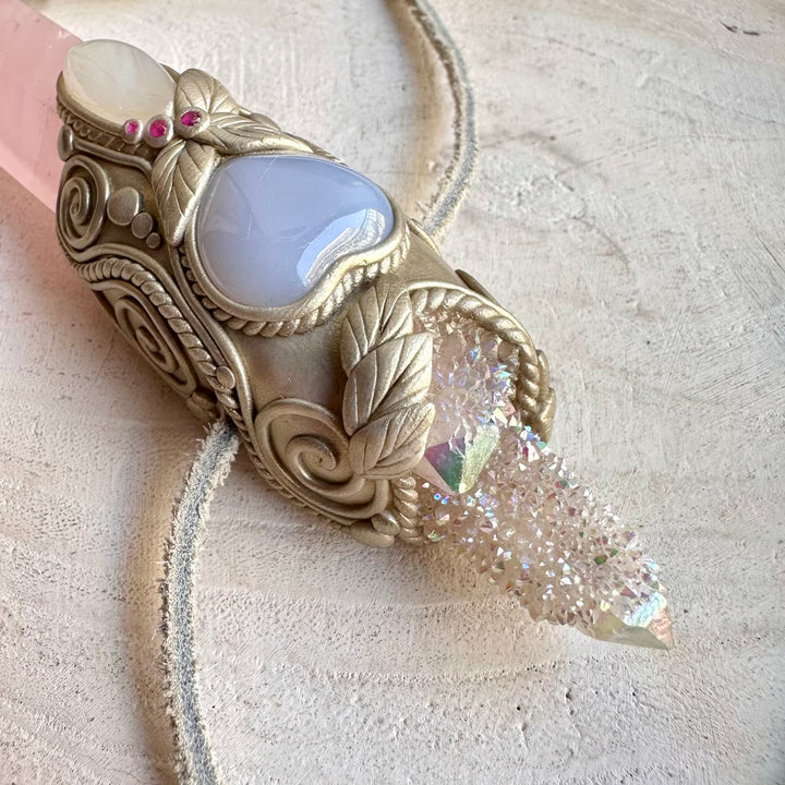Unique crystal wand pendant featuring Angel Aura Spirit Quartz with a heart-shaped Blue Chalcedony gemstone.