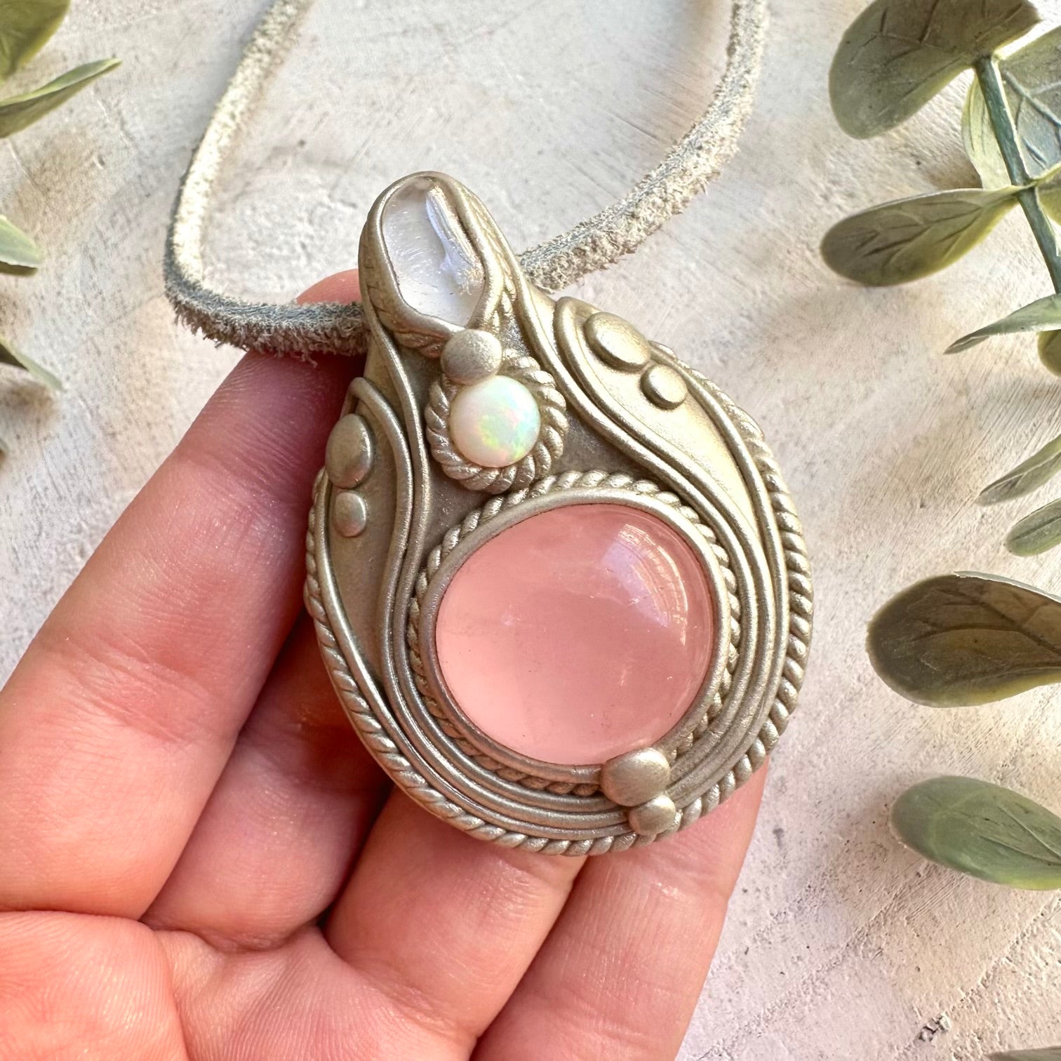 Unique gemstone pendant featuring natural Rose Quartz with translucent Danburite and iridescent Ethiopian Opal.
