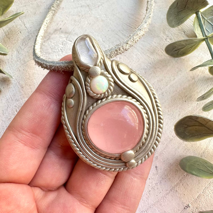 Unique gemstone pendant featuring natural Rose Quartz with translucent Danburite and iridescent Ethiopian Opal.