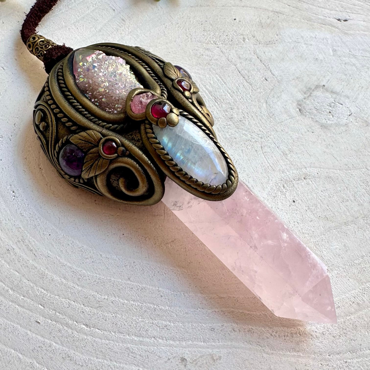 One of a kind healing crystal wand featuring Rose Quartz and genuine natural gemstones.
