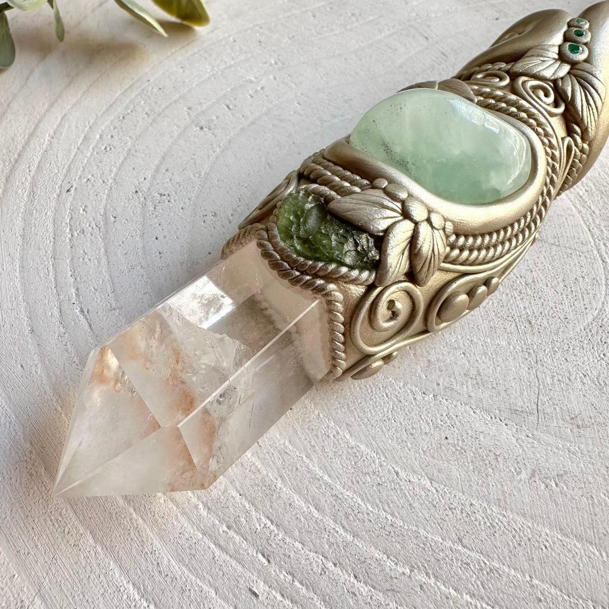 Handmade Selenite healing wand adorned with Moldavite and Emerald gemstones.