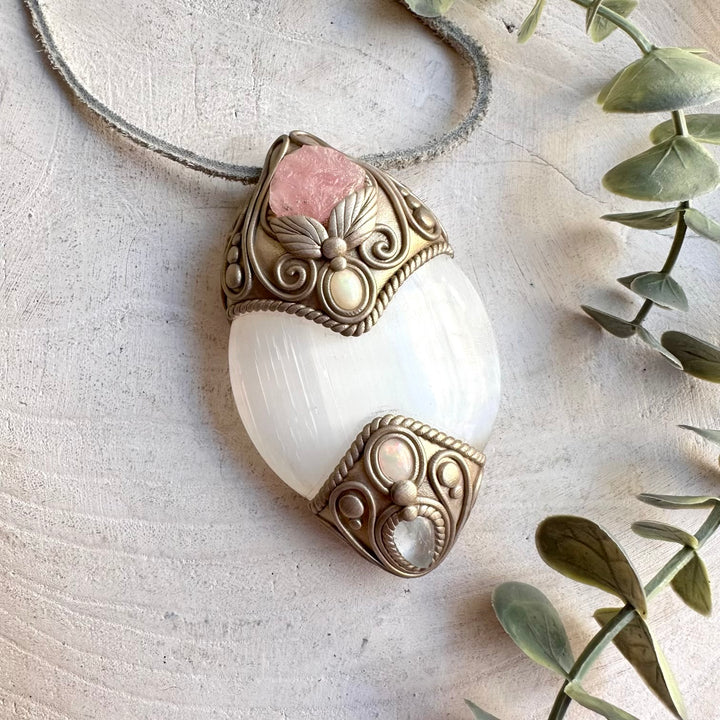 This enchanting gemstone talisman is inspired by clarity, love, emotional harmony, creativity, transformation and spiritual connection. A unique handmade crystal necklace for meditation, energy work, intention setting, spiritual rituals and everyday wear.