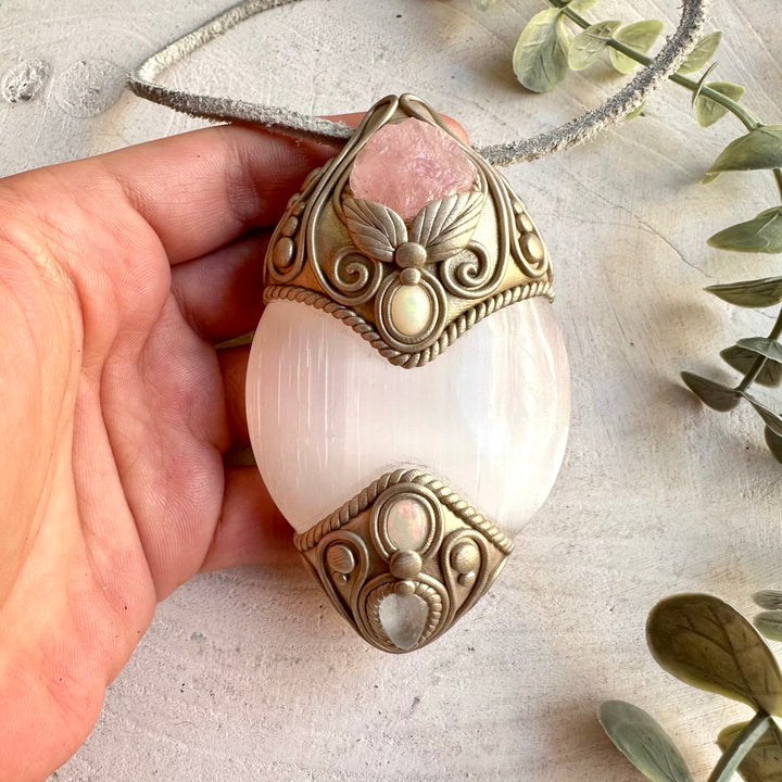 Handmade crystal jewelry combining luminous Selenite with delicate Raw Morganite and Ethiopian Opal.