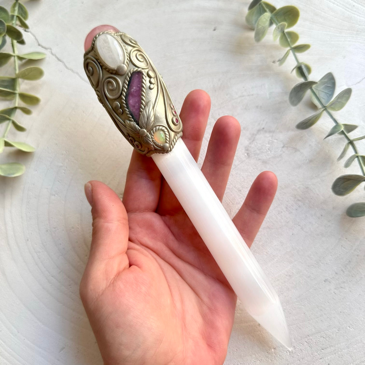 Handmade Selenite Crystal Wand adorned with Rose Quartz, Moonstone, Watermelon Tourmaline, Ethiopian Opal and Ruby. A unique handmade crystal wand for anyone drawn to love, intuition, clarity, transformation and positive energy.