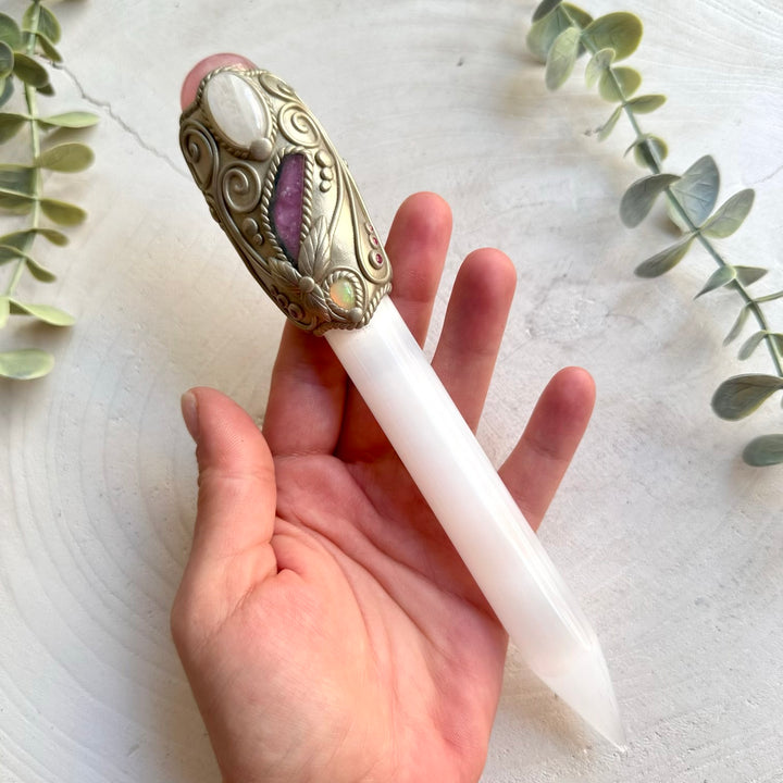 Handmade Selenite Crystal Wand adorned with Rose Quartz, Moonstone, Watermelon Tourmaline, Ethiopian Opal and Ruby. A unique handmade crystal wand for anyone drawn to love, intuition, clarity, transformation and positive energy.