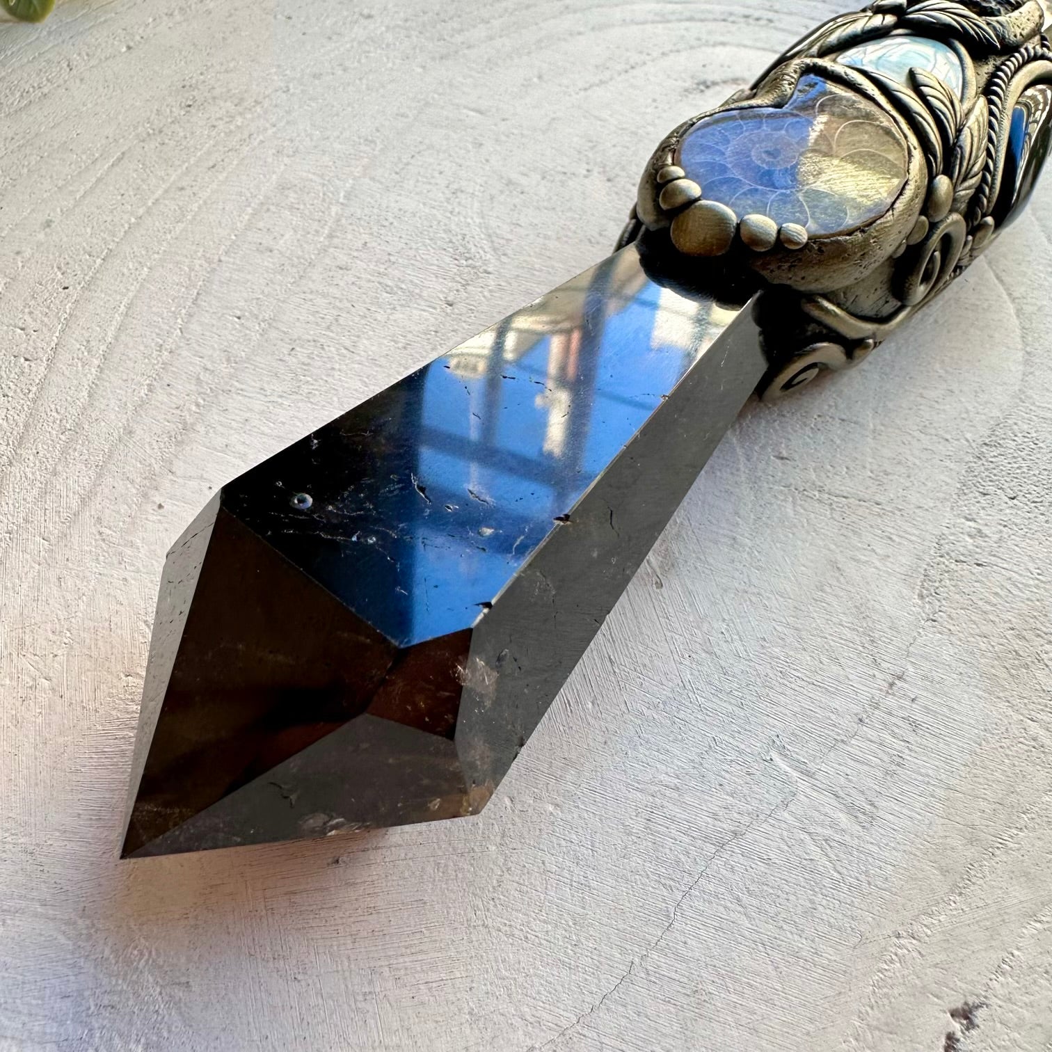 Smoky quartz crystal wand with ammonite and black onyx for ritual use