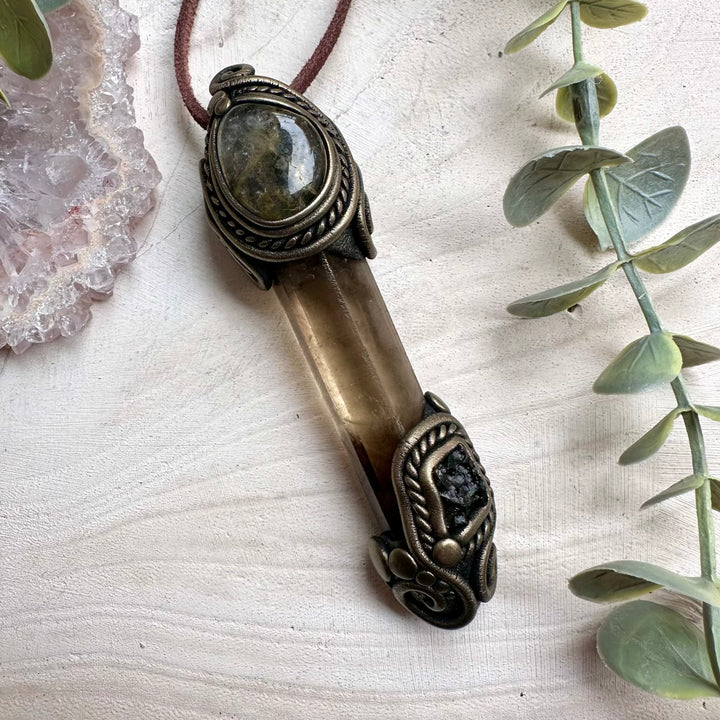 Smoky quartz wand pendant with raw moldavite crystal
