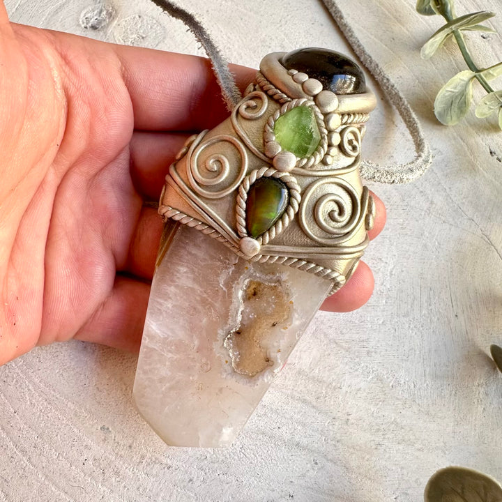 Handmade healing jewelry showcasing an Agate Point with Smoky Quartz and Raw Peridot.