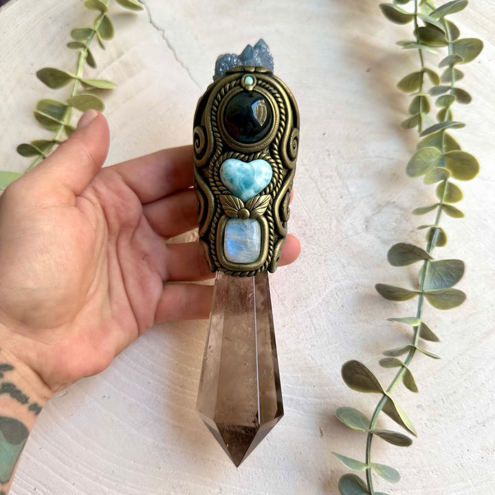 Handmade crystal wand combining Smoky Quartz, Larimar Heart, Rainbow Obsidian and Rainbow Moonstone.
