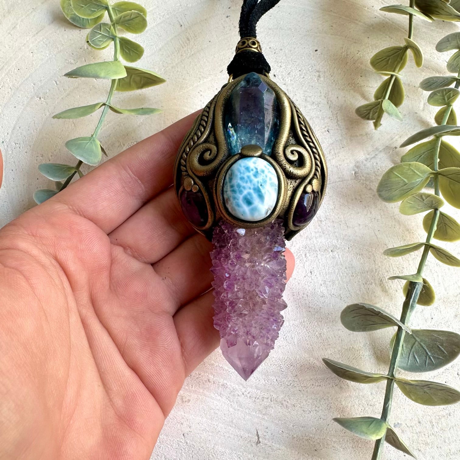 One of a kind crystal wand featuring sparkling Spirit Quartz and luminous Aqua Aura Quartz.