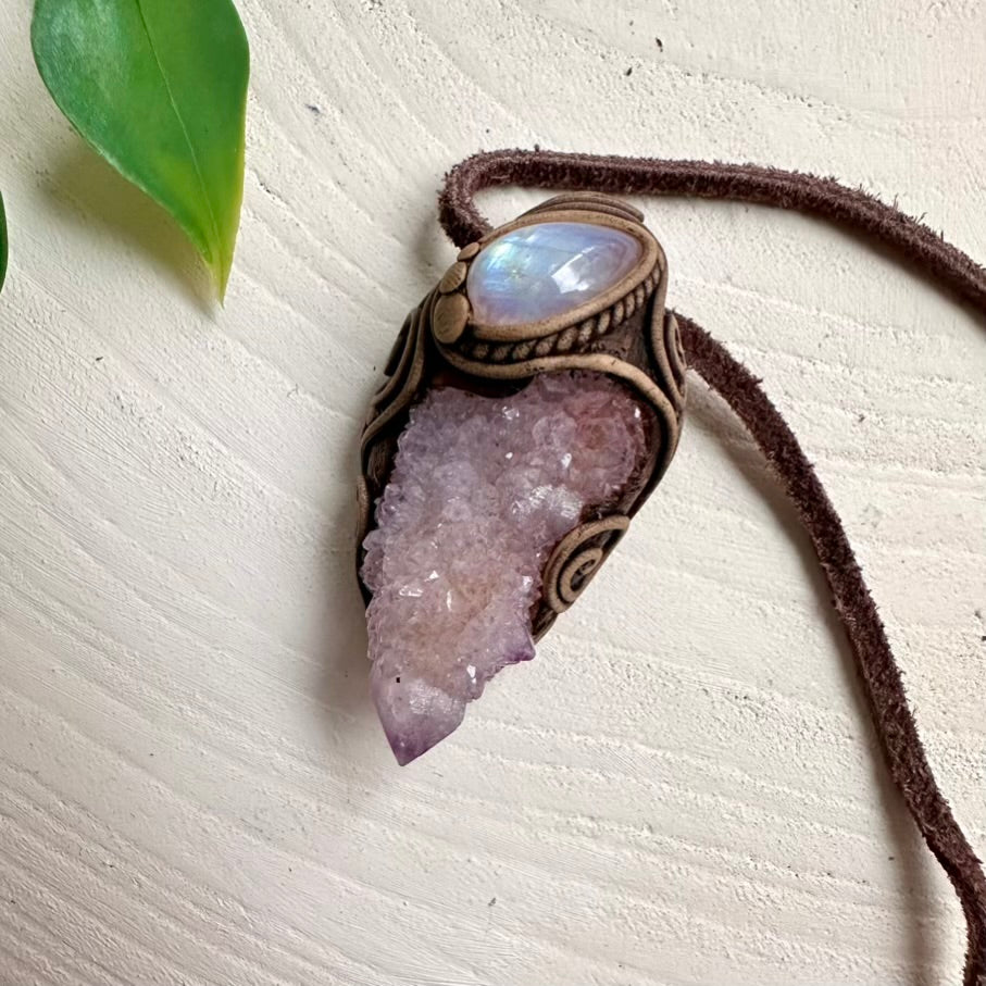 Spirit Quartz crystal pendant paired with Rainbow Moonstone