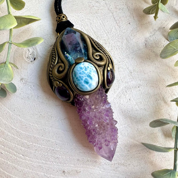 Handmade Spirit Quartz healing crystal wand and pendant necklace featuring Aqua Aura Quartz, Amethyst and Larimar.