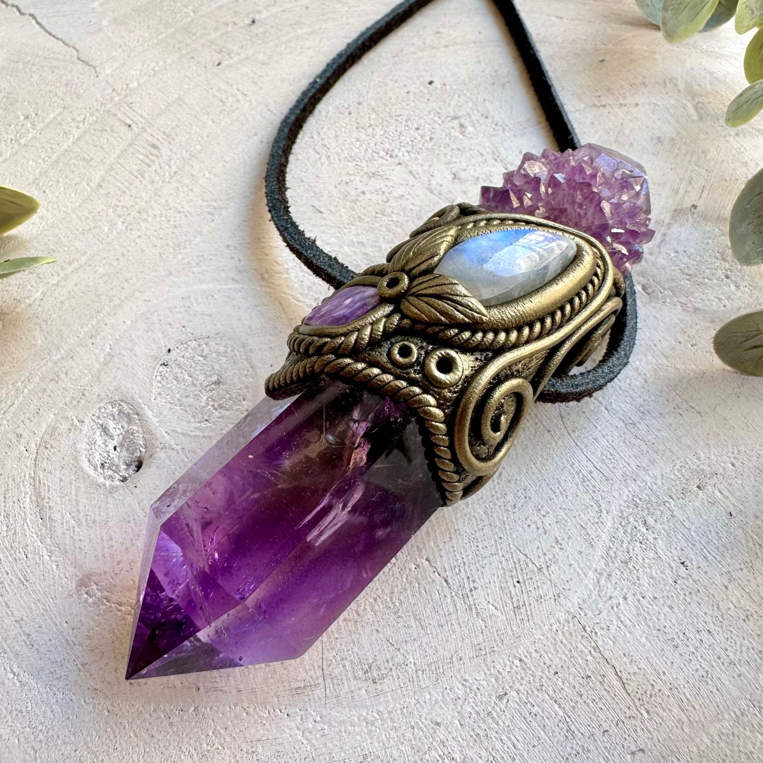 Spiritual crystal jewelry showcasing sparkling Spirit Quartz with Amethyst and Charoite.