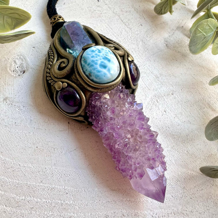 Natural Spirit Quartz wand featuring Amethyst and a beautiful Larimar gemstone accent.