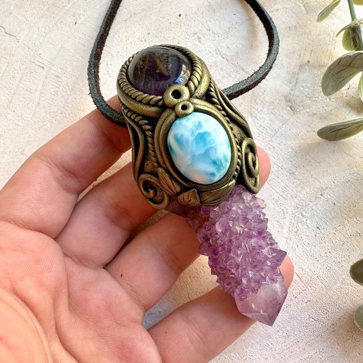 Handmade healing crystal pendant with Spirit Quartz, Larimar and Amethyst natural stones.