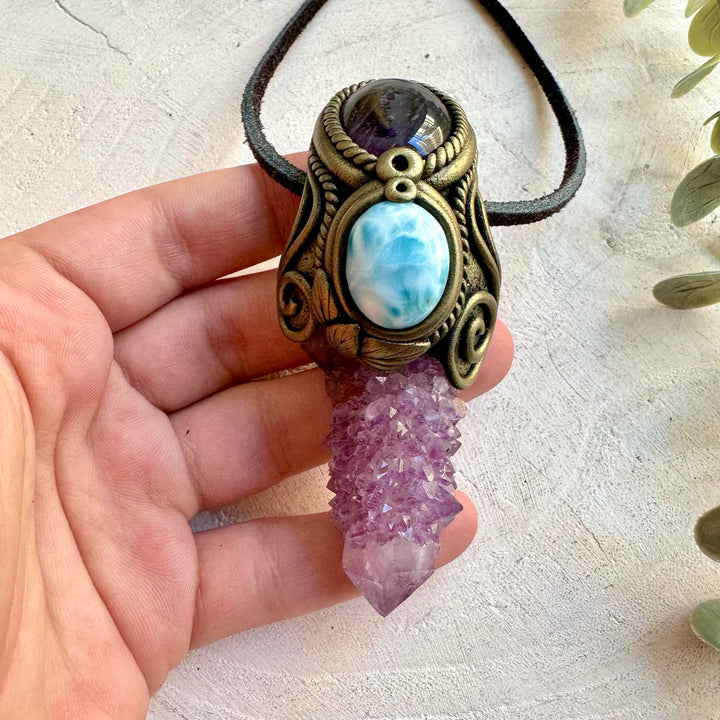 Handmade gemstone necklace combining Spirit Quartz with Larimar and Amethyst accents.