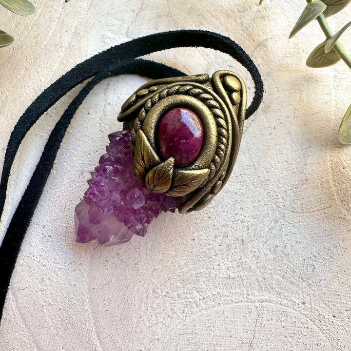 Handmade boho healing crystal necklace featuring Spirit Quartz and Ruby, a unique crystal talisman designed for spiritual growth, vitality, confidence, emotional balance and positive energy.
