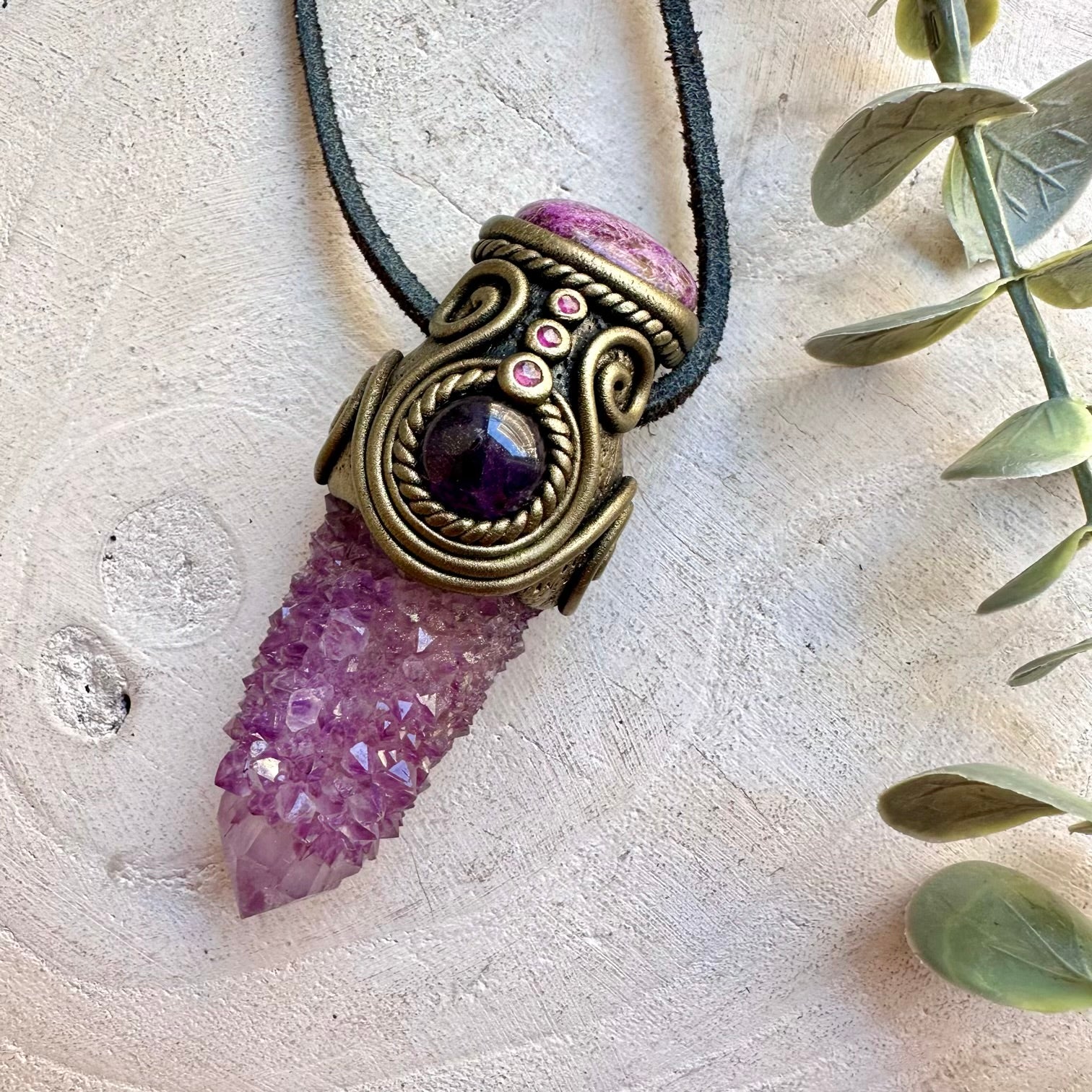 Unique spiritual jewelry showcasing Spirit Quartz with soft pink Stichtite and deep purple Amethyst.