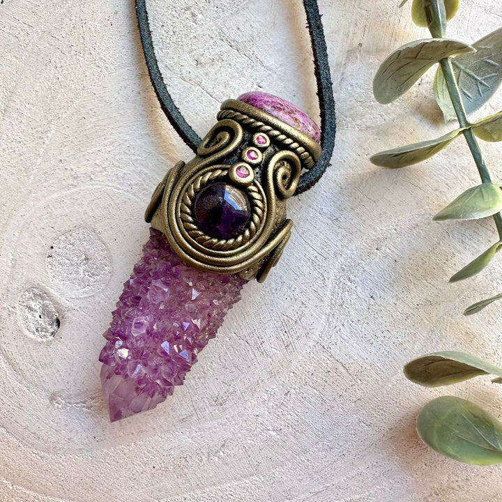 Unique spiritual jewelry showcasing Spirit Quartz with soft pink Stichtite and deep purple Amethyst.