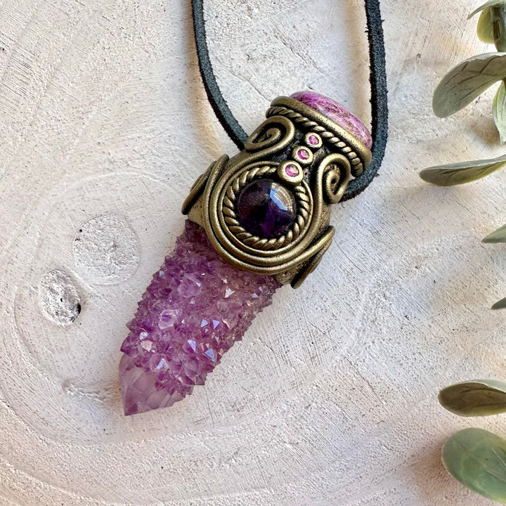 Unique crystal pendant featuring Spirit Quartz with soft pink Stichtite and rich purple Amethyst.