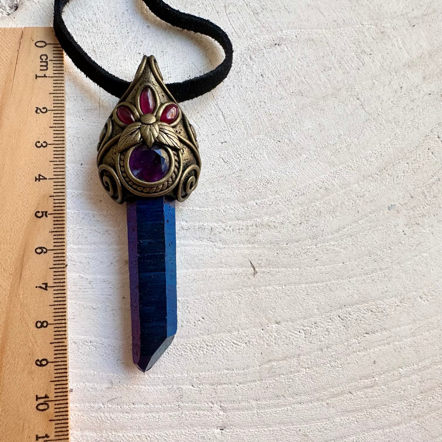 Handmade Cobalt Aura Quartz pendant necklace featuring Rainbow Fluorite and Rhodolite Garnet, a one of a kind crystal jewelry piece designed to bring together vibrant color, natural beauty and spiritual symbolism.