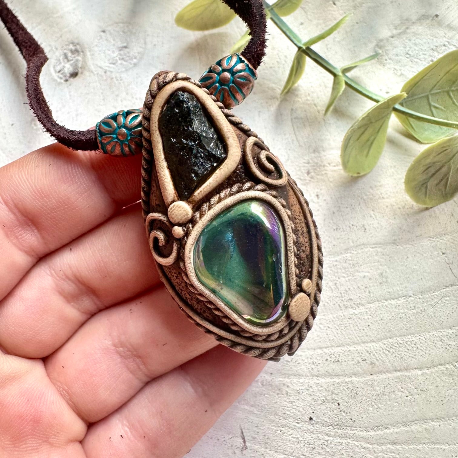 Beautiful Aqua Aura Quartz and Moldavite necklace with calming blue and green natural gemstones.