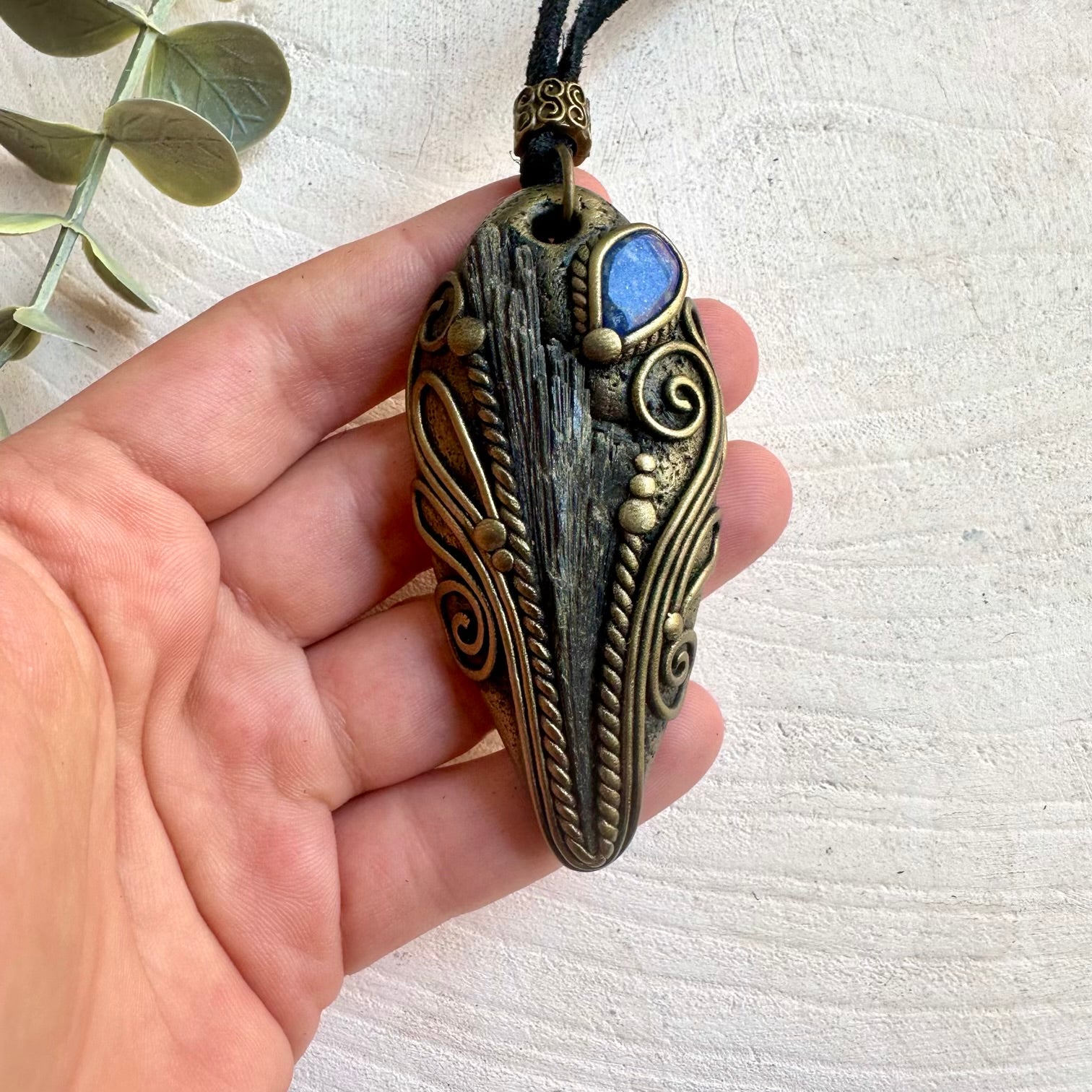 Unisex crystal pendant necklace made with Black Kyanite and Lapis Lazuli for a timeless look.
