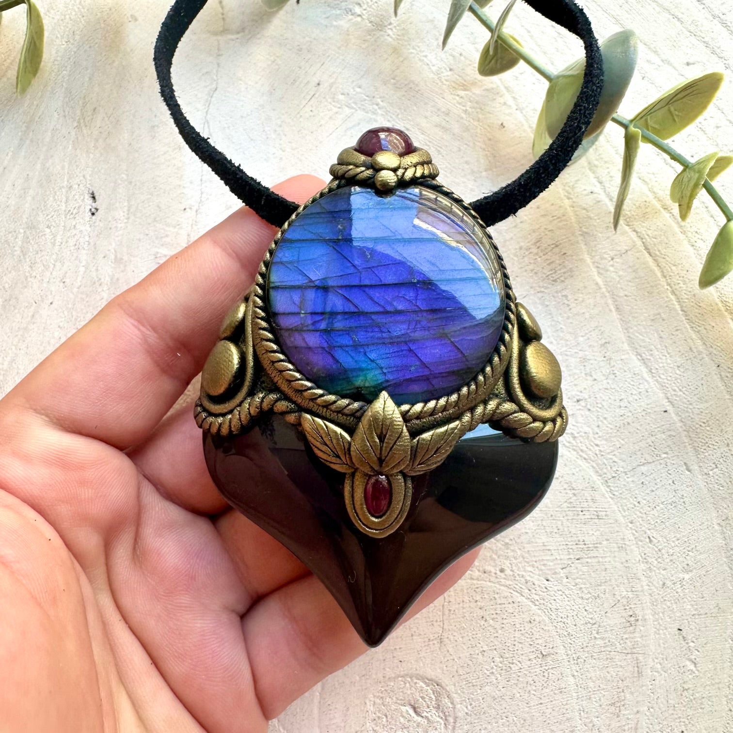 One of a kind gemstone necklace handcrafted with Rainbow Obsidian and colorful natural crystals.