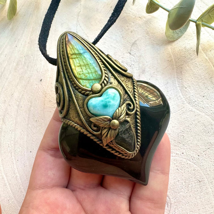 Healing crystal talisman featuring Rainbow Obsidian, Labradorite, Larimar and Moldavite.