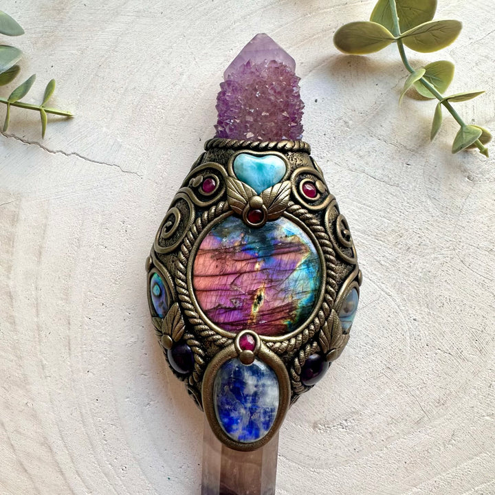 Crystal healing tool designed with Rainbow Fluorite for meditation, intention setting and energy work.