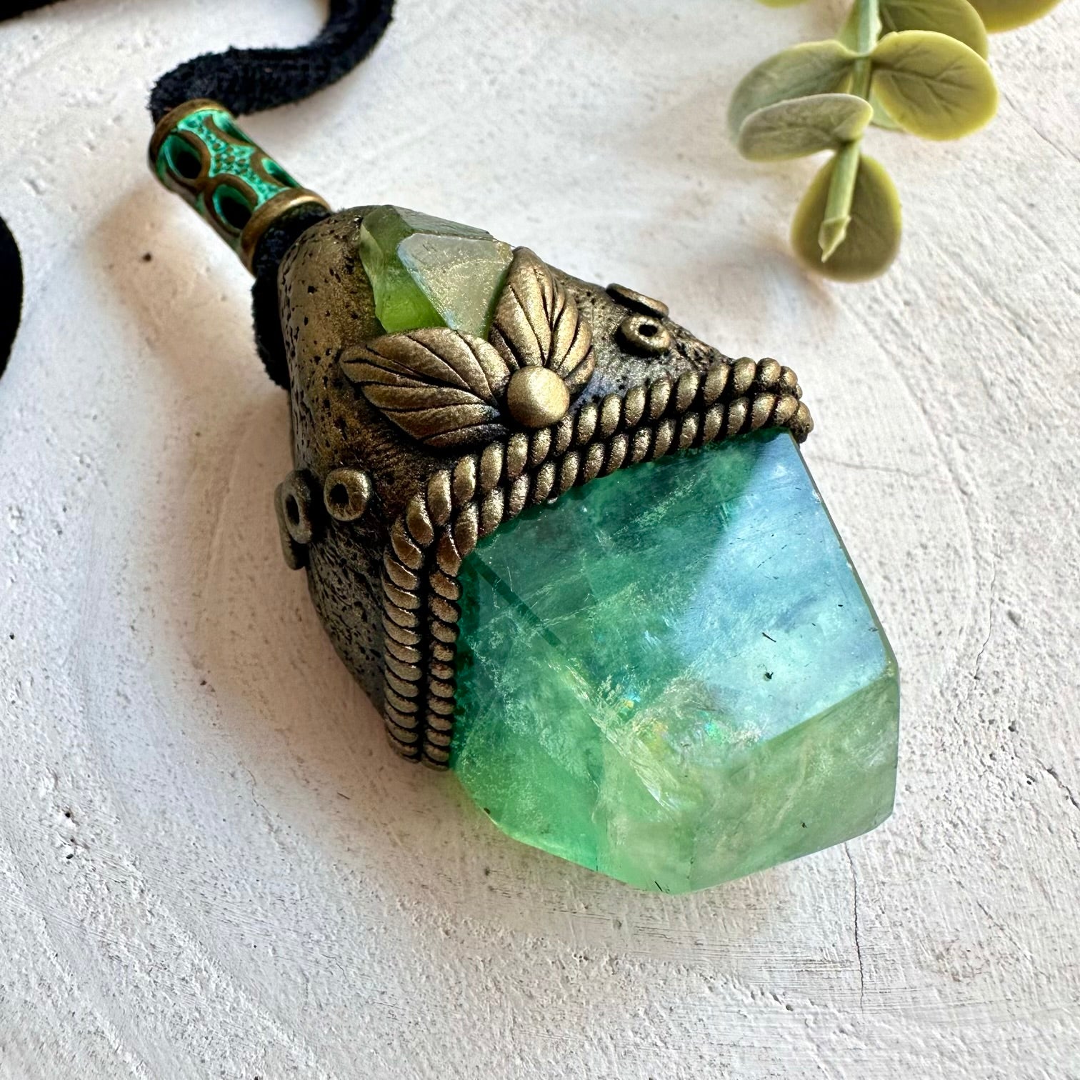 Spiritual gemstone jewelry featuring Green Fluorite and Peridot in an artisan setting.