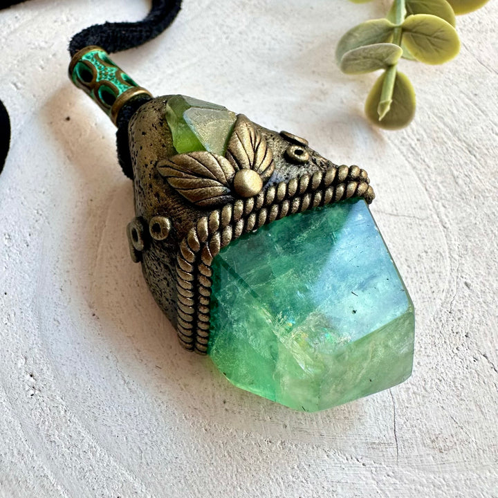 Spiritual gemstone jewelry featuring Green Fluorite and Peridot in an artisan setting.