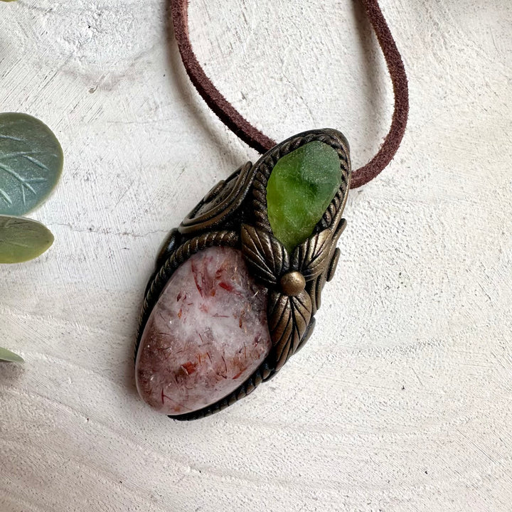 Handmade gemstone jewelry featuring Hematite Quartz and Peridot for chakra healing and spiritual balance.
