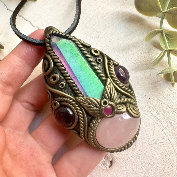 Rose Quartz pendant necklace featuring an Angel Aura Quartz Point, Amethyst and Rhodolite Garnet, a one of a kind crystal talisman designed for self-love, emotional healing, spiritual connection and heart-centered energy. Artisan gemstone jewelry crafted with genuine natural crystals.