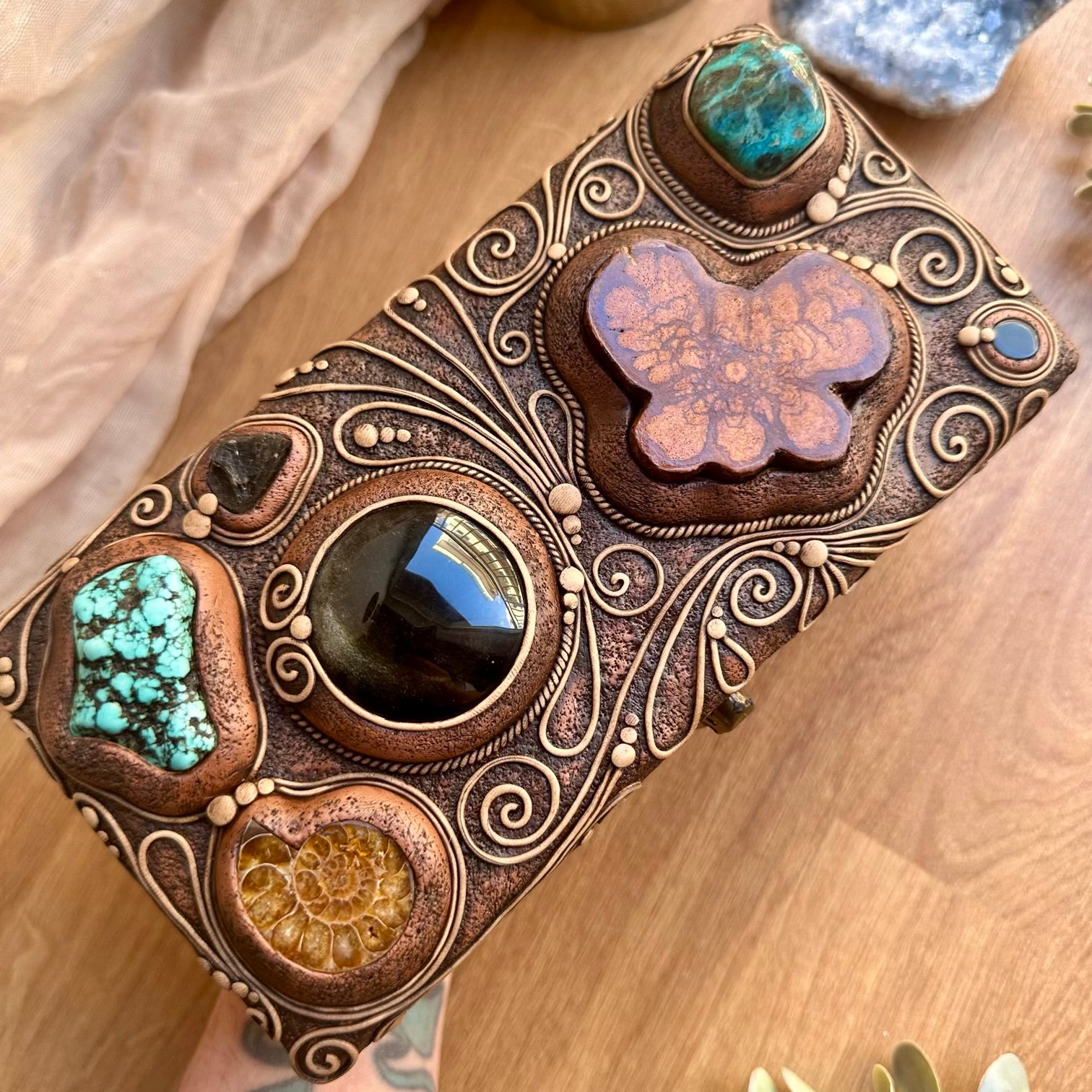 One-of-a-kind wooden box decorated with healing crystals