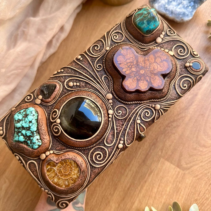 One-of-a-kind wooden box decorated with healing crystals