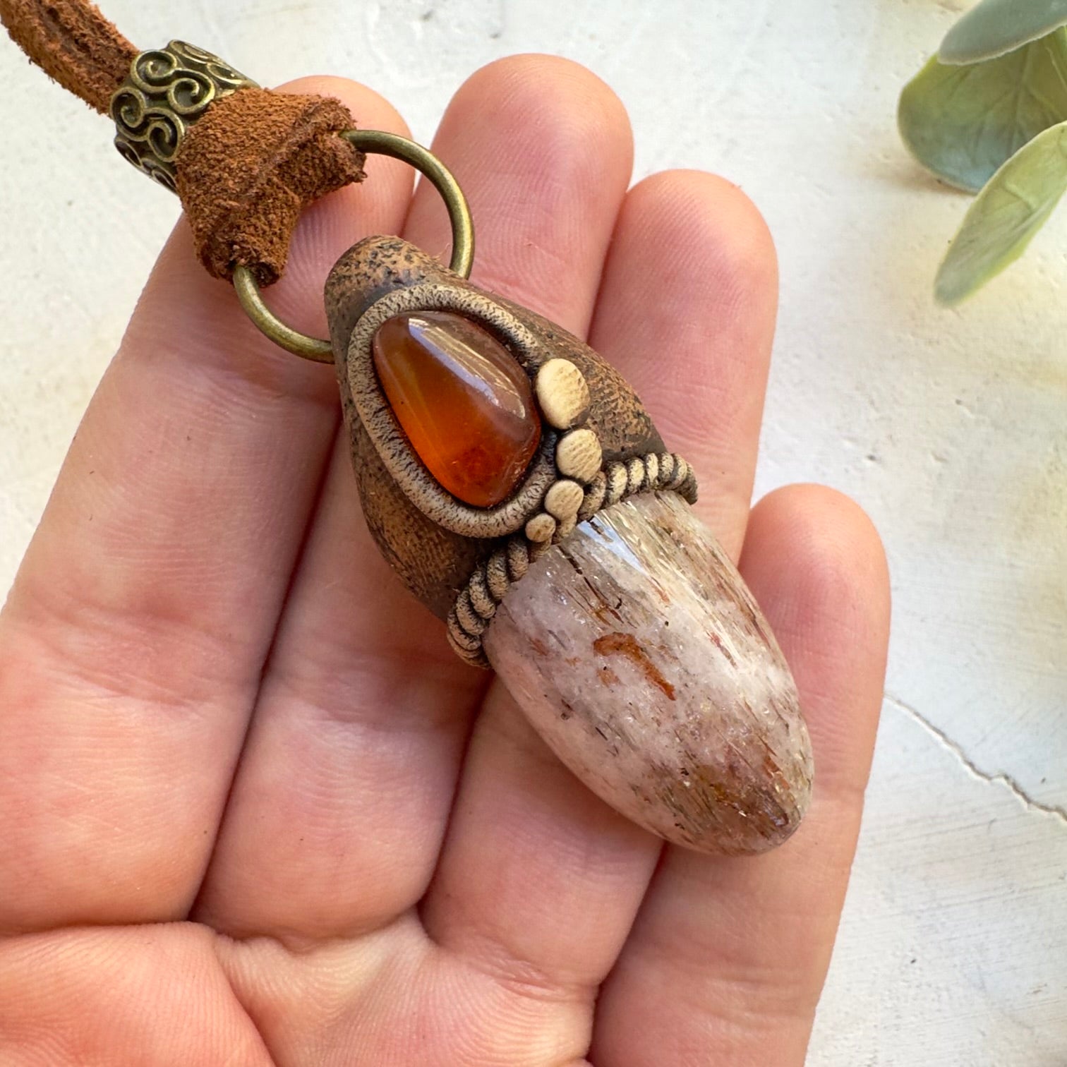Natural gemstone necklace featuring Amber and Quartz crystal