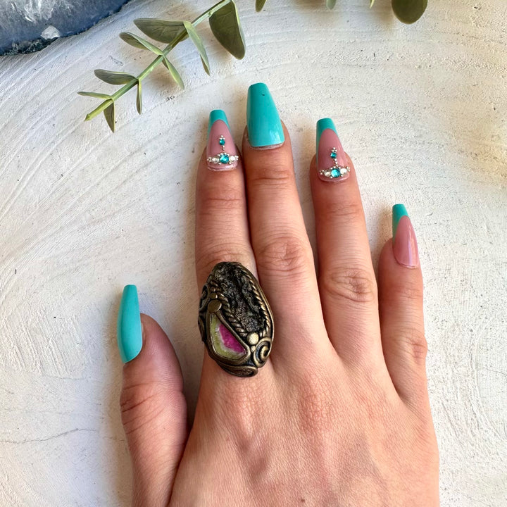 Spiritual jewelry ring combining moldavite and watermelon tourmaline