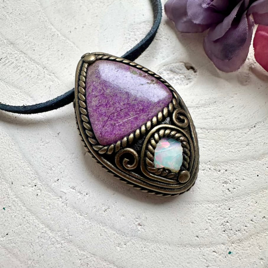 Handmade Stichtite heart chakra stone with radiant raw Ethiopian Opal fire flash, wearable energy talisman.