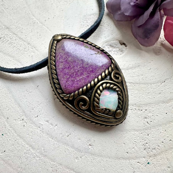 Handmade Stichtite heart chakra stone with radiant raw Ethiopian Opal fire flash, wearable energy talisman.