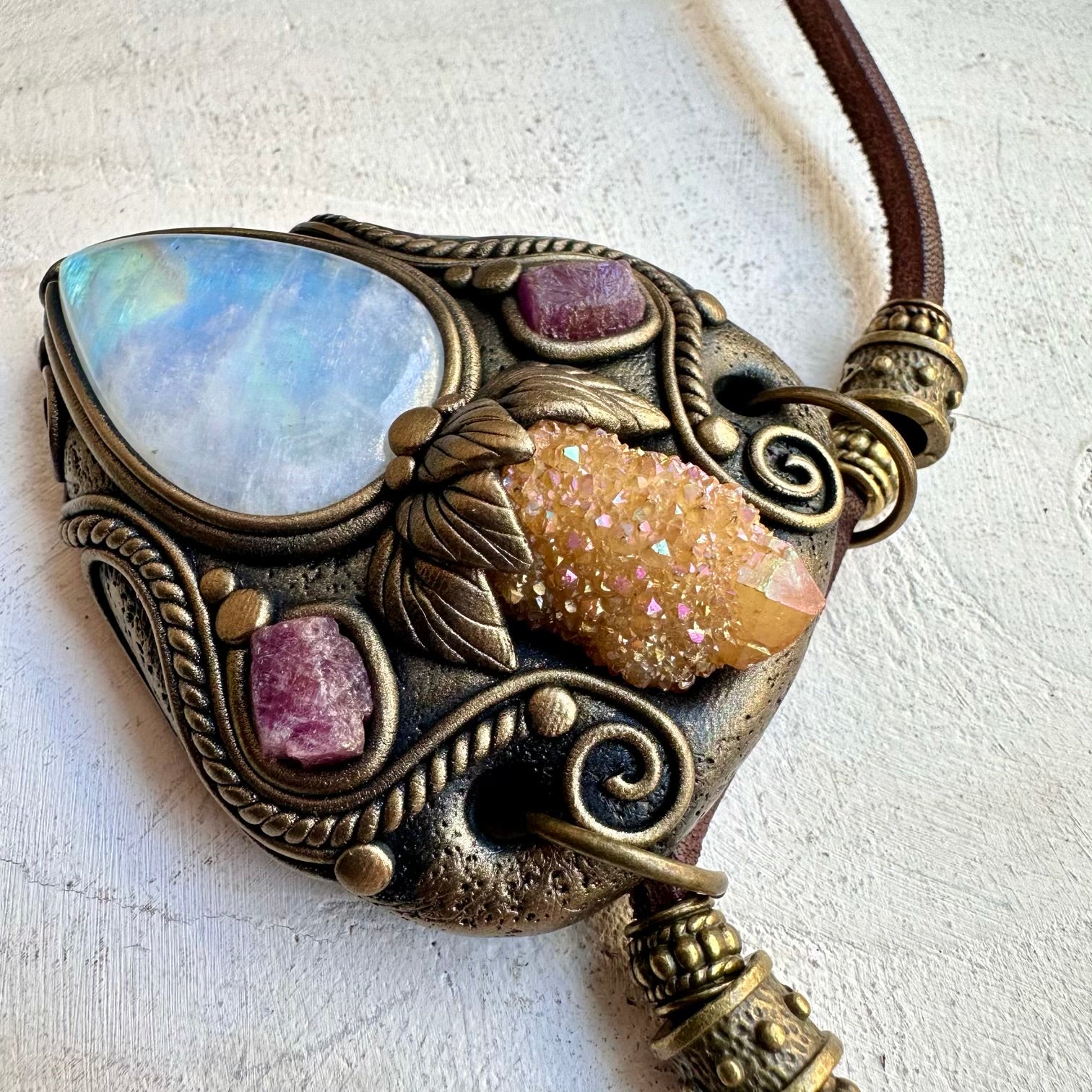 Spiritual jewelry combining moonstone aura quartz and ruby