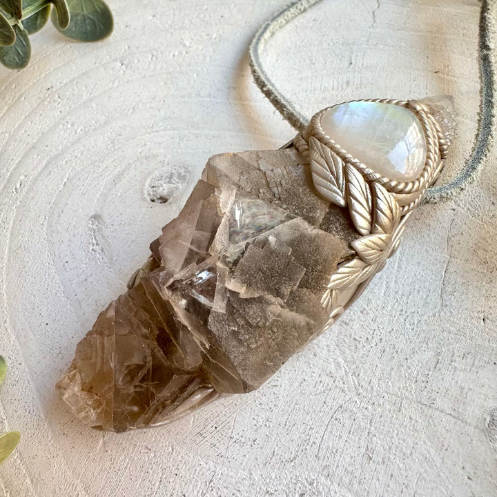 Metaphysical crystal jewelry handmade and one of a kind with natural healing crystals